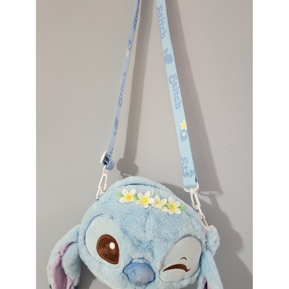 Plush Blue Stitch Face Crossbody Bag with Floral Accent